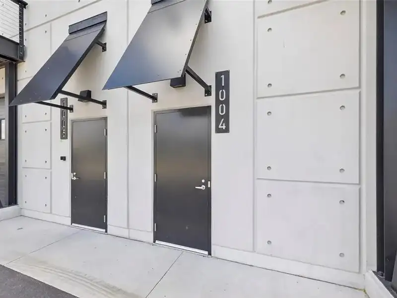 Exclusive Balcony Unit at the Motor Enclave with Private Garage and Racetrack Views