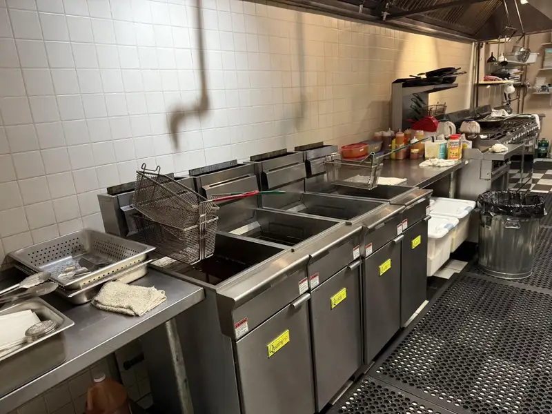 Turnkey Restaurant and Bar with Income-generating Tenants on Prime .62-acre Lot