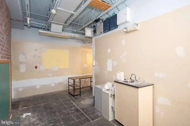 Versatile 6,000 Sq Ft Commercial Space in Prime Location with Parking Potential