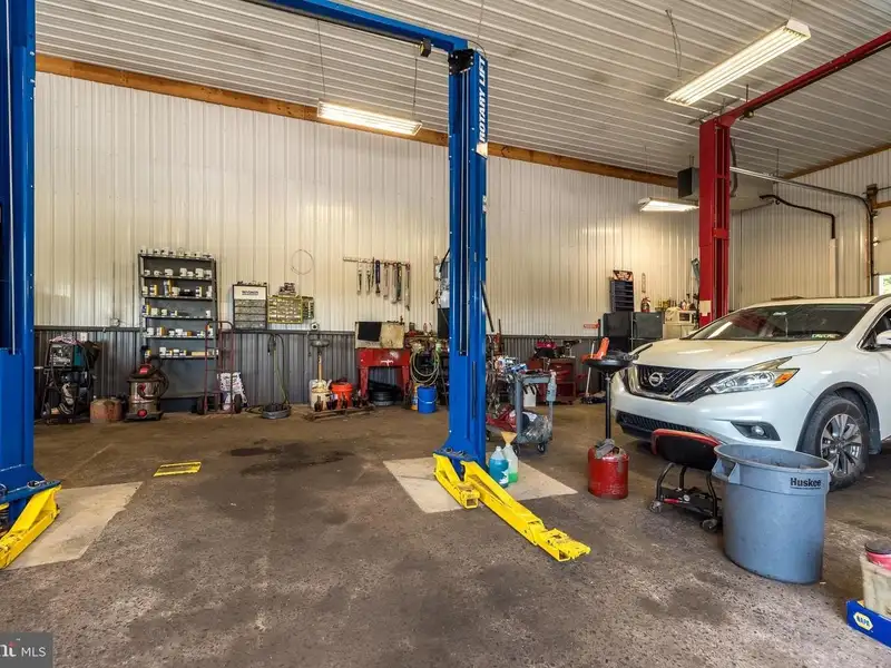 Auto Repair Shop with Residential Income Opportunity in Prime Location