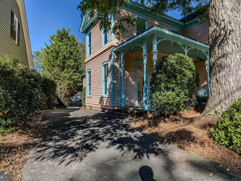 Versatile Commercial Building Near Downtown with Parking and Apartment Potential