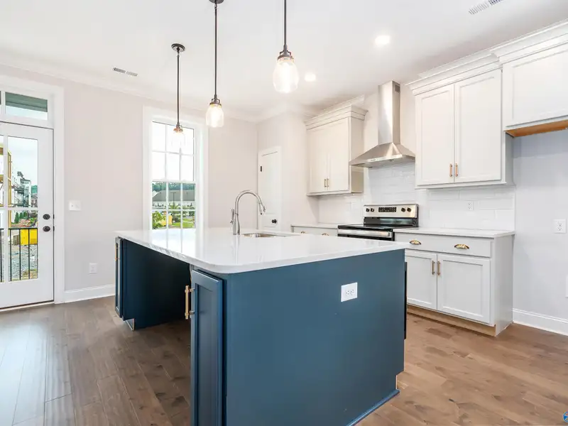 Live/work Townhome with Flex Space, Gourmet Kitchen, and 2-car Garage in Prime Location
