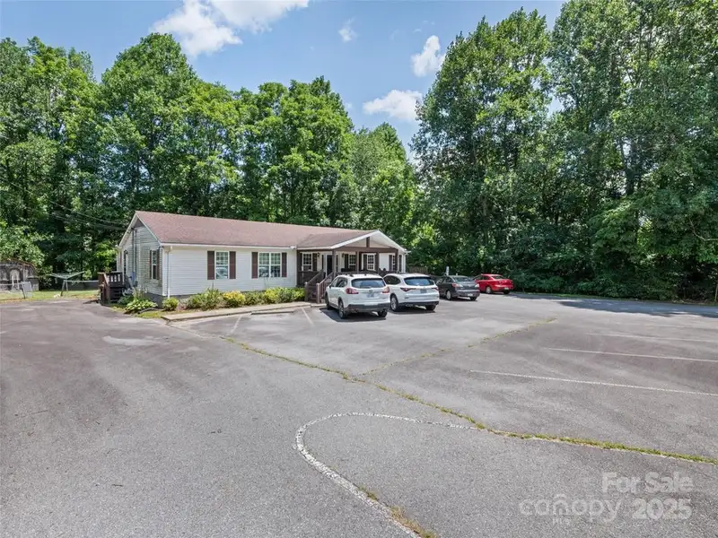 Versatile Commercial/residential Property on Hwy 209 with Ample Parking and Accessibility Features
