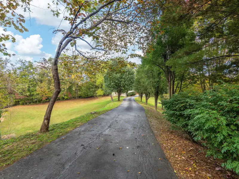 Multi-use Property on 16+ Acres with Home, Barndominium, Pond, and Pool in Western Nc