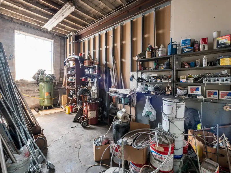 Mixed-use Property with 1-bedroom Apartment in Well-maintained Building