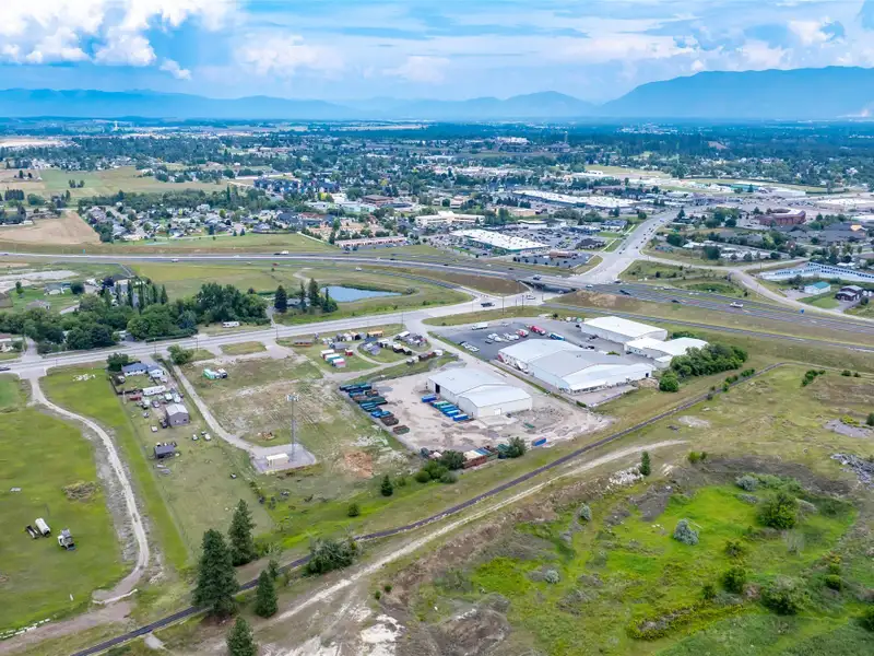 Flexible Development Site with Highway 2 Access and Income-generating Cell Tower