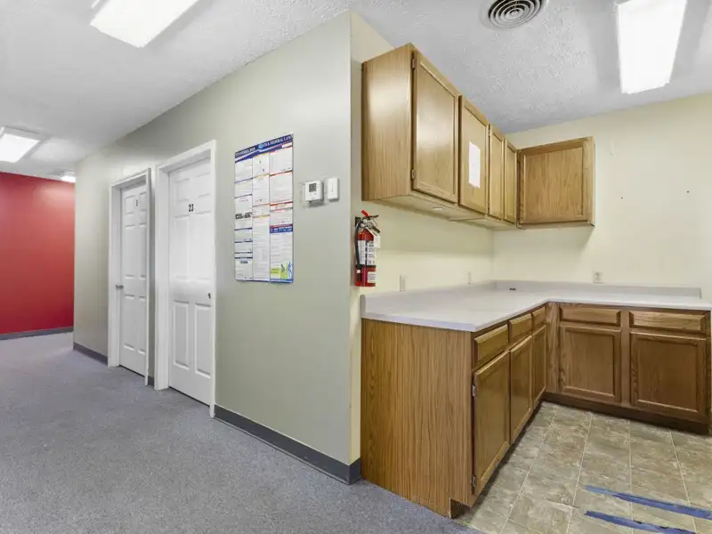 Versatile 4,305 Sq Ft Office Building with Apartment on Highway 11e