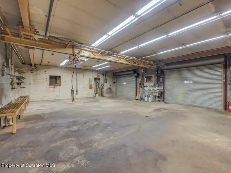 Mixed-use Property in Throop: 7-bay Garage and Updated 2-bedroom Apartment