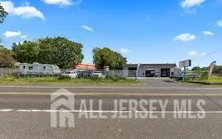 Turnkey Automotive Business with Car Dealership, Mechanic & Auto Body Shop in Prime Location