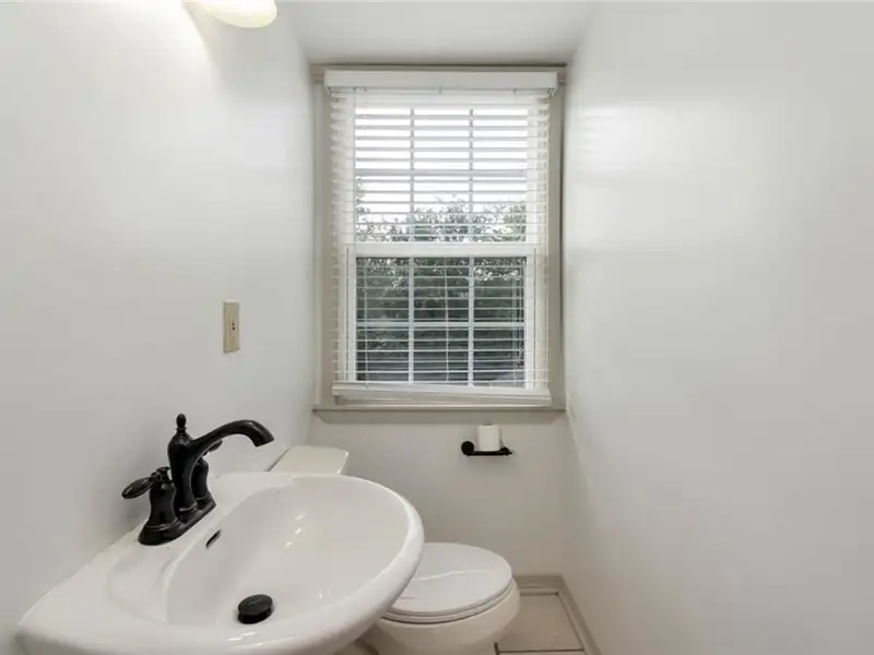 Mixed-use Property in Downtown Mobile with High Ceilings and Fenced Yard