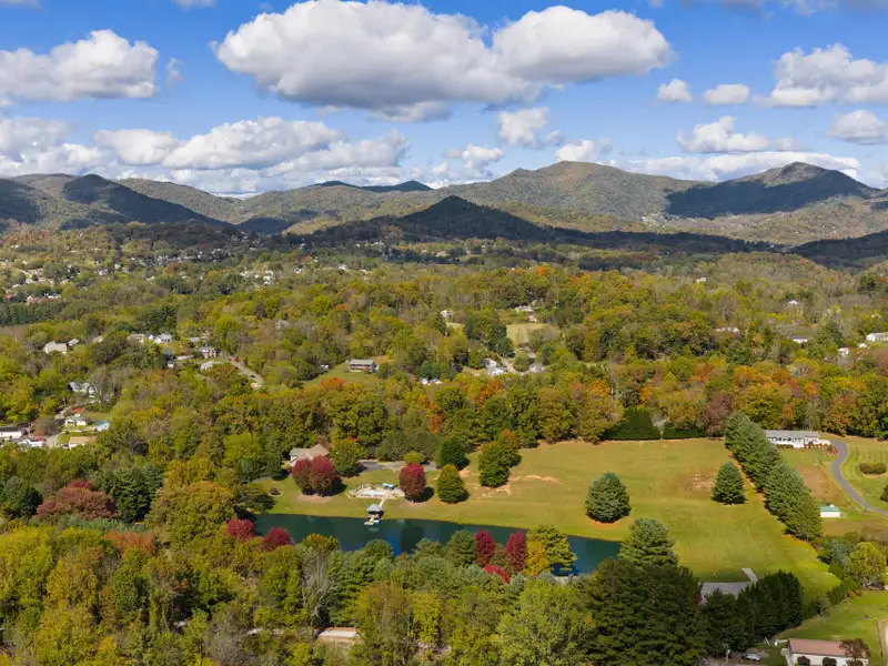 Multi-use Property on 16+ Acres with Home, Barndominium, Pond, and Pool in Western Nc