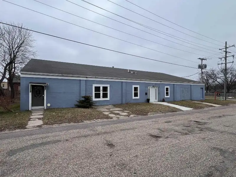 Versatile Mixed-use Property with Office Space and Storage in Residential Area