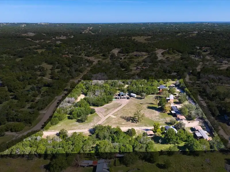 10-acre Mobile Home Community with 5 Units, Fenced, Workshop, and Growth Potential