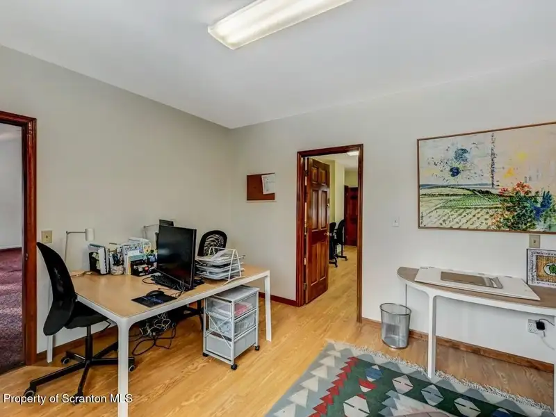 Versatile Former Church Building in Peaceful Location with Ample Parking and Creative Potential