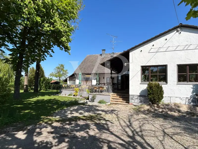 Versatile Residential and Commercial Building with Restaurant in Münchsmünster