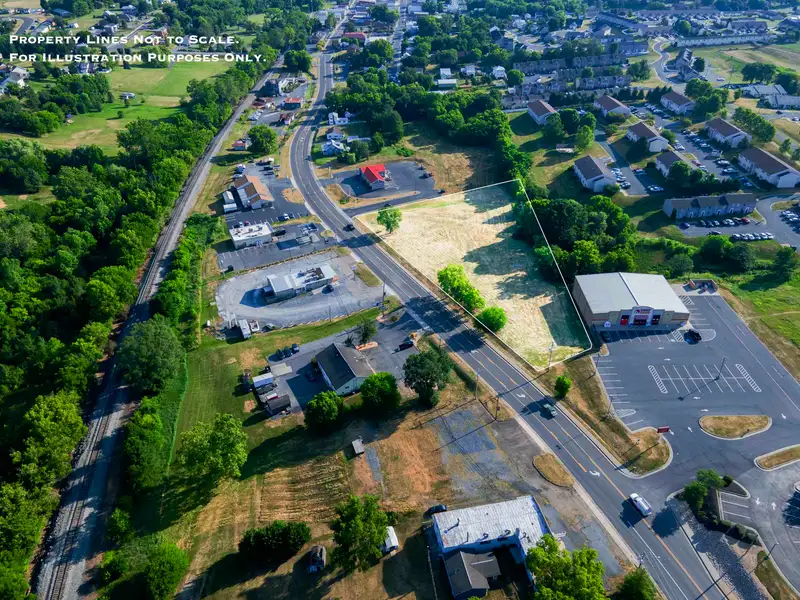 1 Acre Commercial Lot with Road Access in Broadway, Ideal for Coffee Shop or Drive-thru