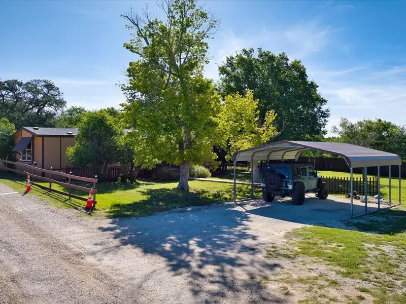 10-acre Mobile Home Community with 5 Units, Fenced, Workshop, and Growth Potential