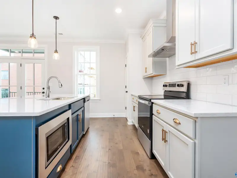 Live/work Townhome with Flex Space, Gourmet Kitchen, and 2-car Garage in Prime Location