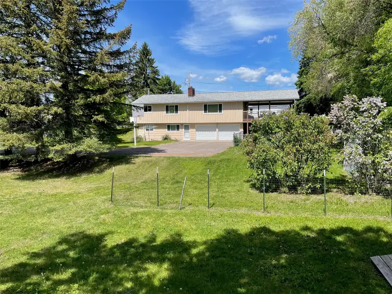 Commercial Corner Lot with 3 Bed Home in Columbia Falls, High Traffic Area