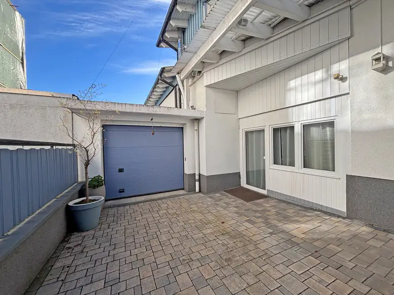 Modernized Detached House with Commercial Space in Family-friendly Location