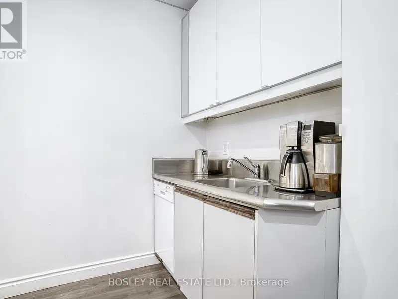 Renovated South-facing Office Condo with Views at 130 Carlton St, Toronto