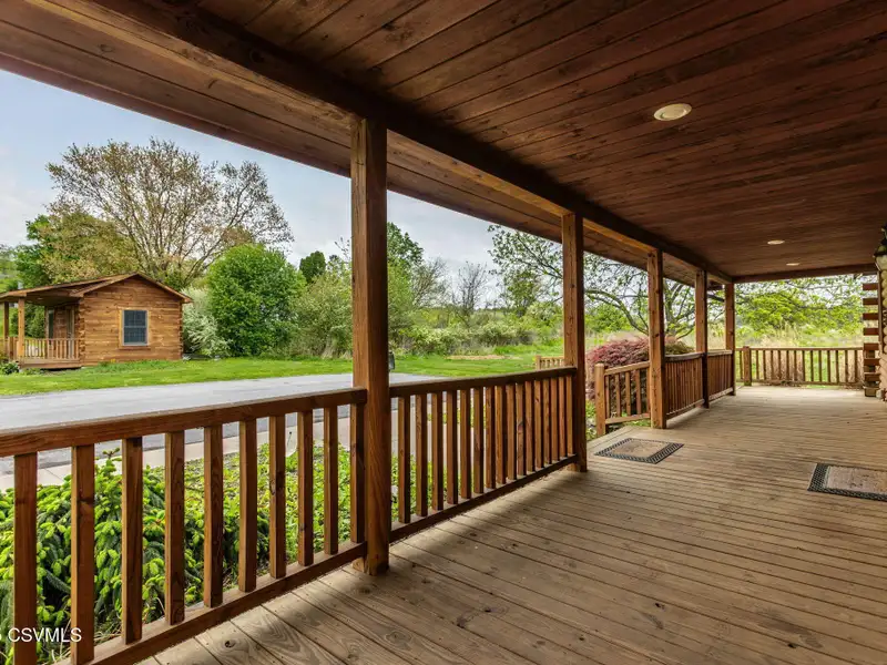 Commercial Log Home on 2 Acres with 3 Bedrooms and Scenic Views