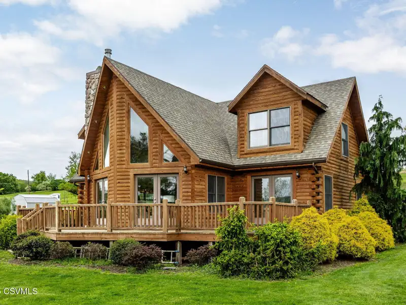 Commercial Log Home on 2 Acres with 3 Bedrooms and Scenic Views