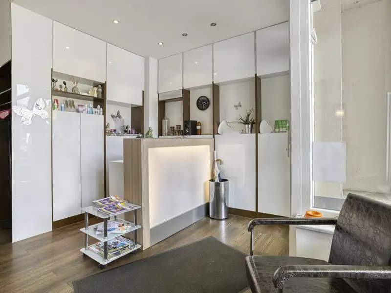 Versatile Ground-level Retail Space with Dual Entrances and Basement Storage