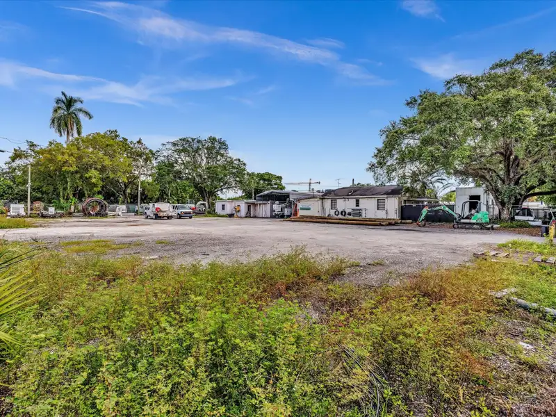 Commercial Property with Office Space and Residential Unit in Industrial Area