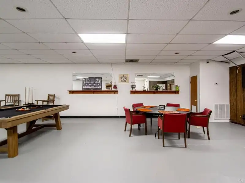 Office Space with Meeting Area, Kitchen, and Security Features in Convenient Location