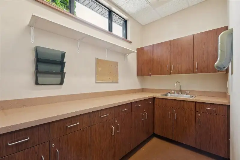 Versatile Commercial Condo for Sale Near Hwy 151 & 41 with Multiple Offices and Amenities