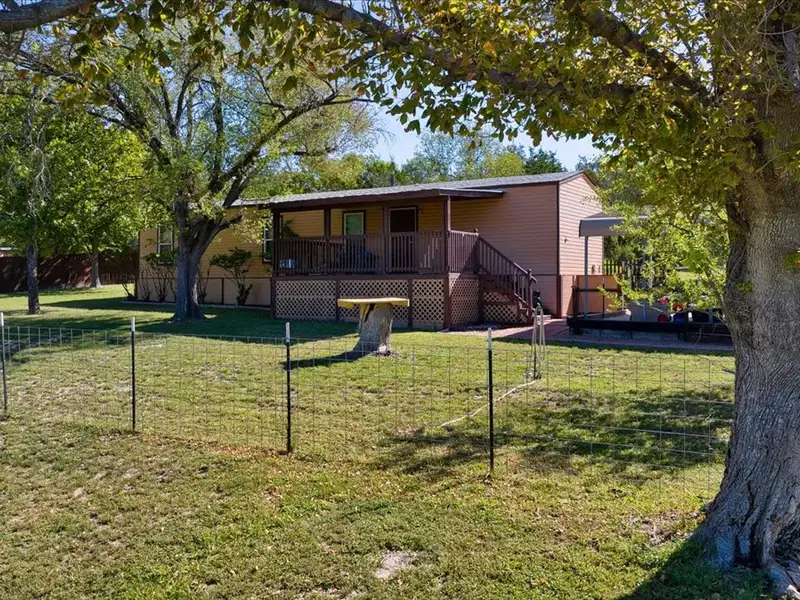10-acre Mobile Home Community with 5 Units, Fenced, Workshop, and Growth Potential