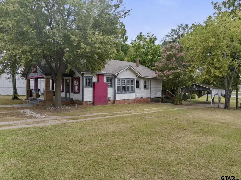 Prime Commercial Property with Building and Home on Half Acre Lot