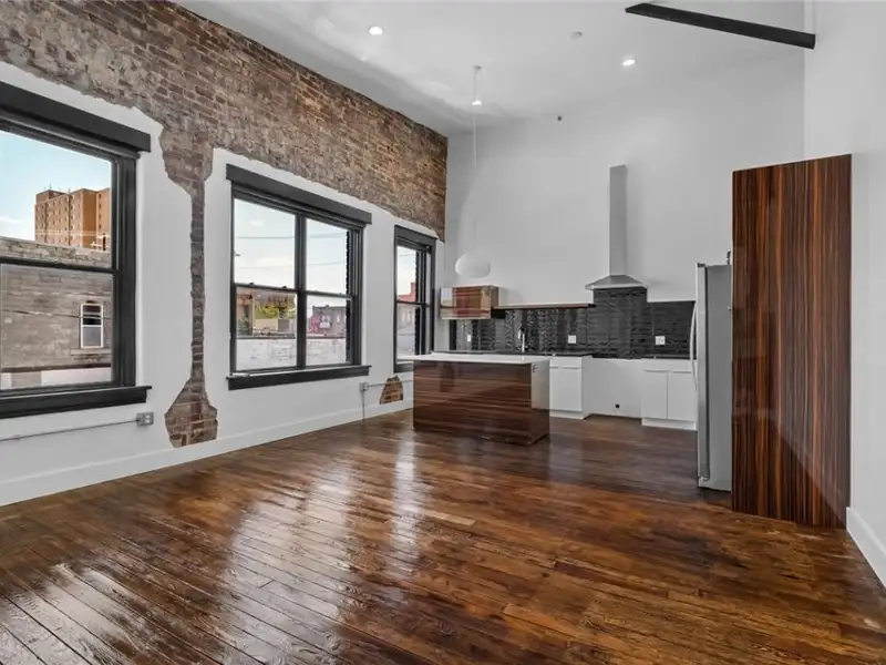 Mixed-use Commercial Property with Retail Space and Renovated Apartments in Downtown Joplin