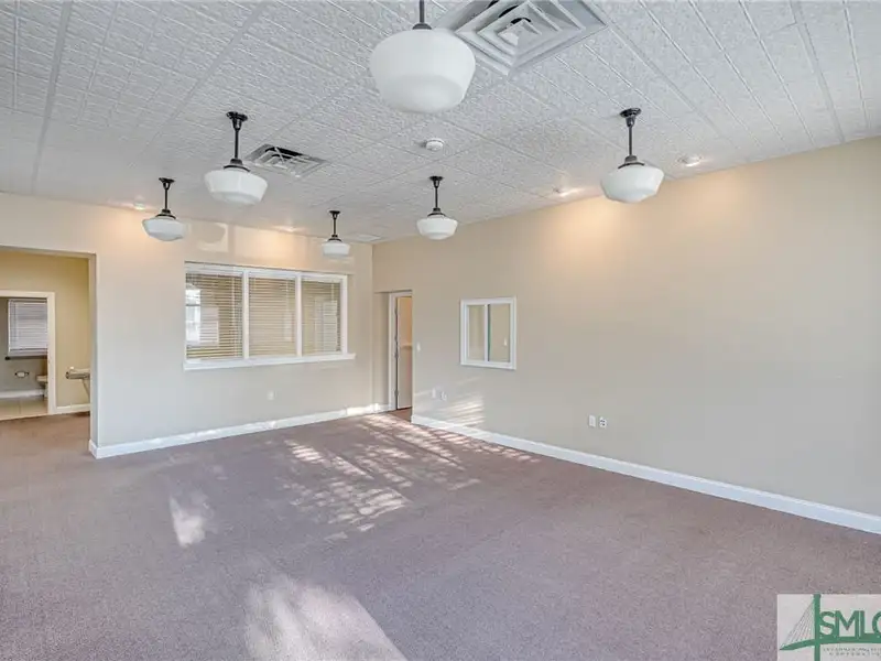 Two-story Office Building in Downtown Savannah with Off-street Parking and Renovated Interiors