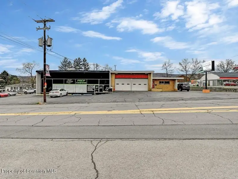 Mixed-use Building with Retail Space and Parking for Sale in Prime Location