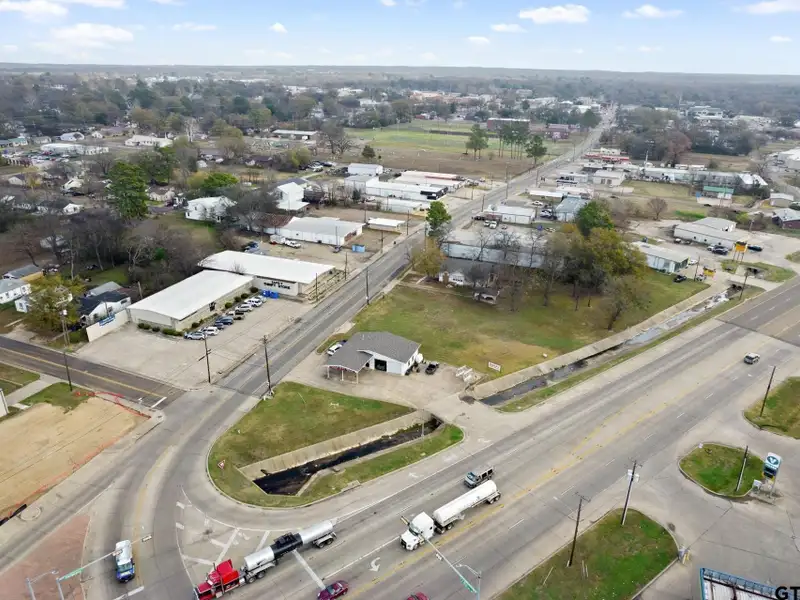 Prime Commercial Property with Building and Home on Half Acre Lot
