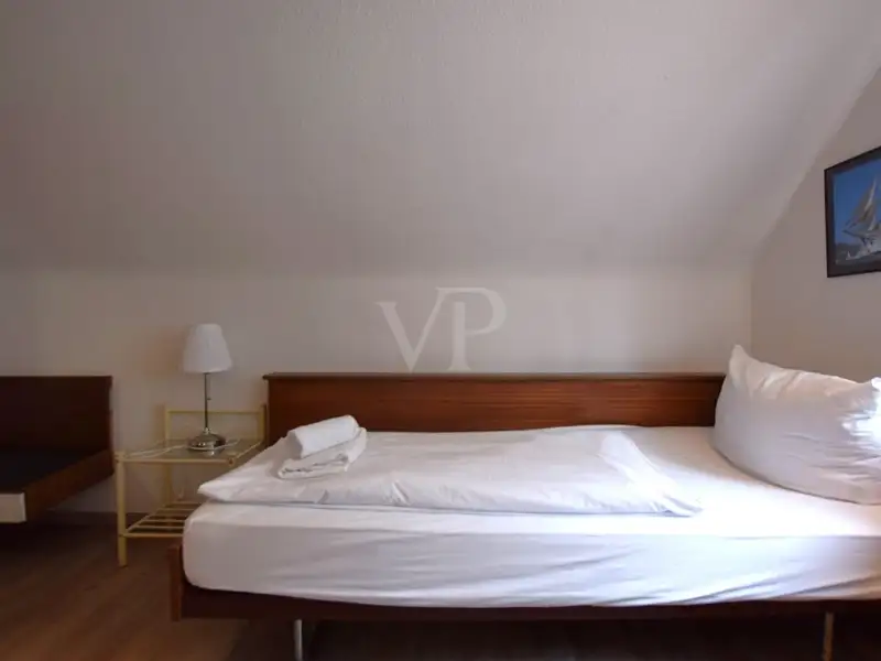 Historic Family-run Hotel in Ansbach with Restaurant, Guest Rooms, and Green Energy Features