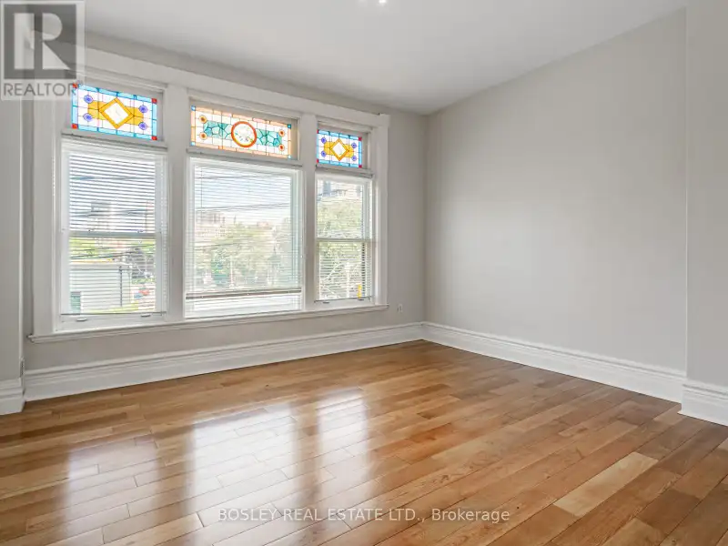 Charming Two-storey Apartment in Landmark Building on Queen St West