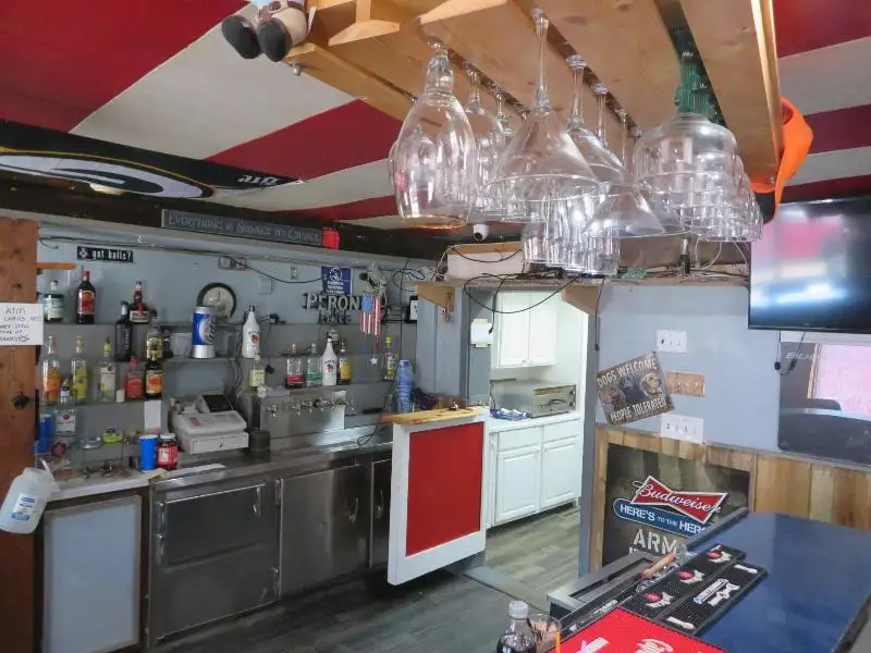 Turnkey Bar/restaurant with 2-bedroom Apartment and Development Potential in Northwoods