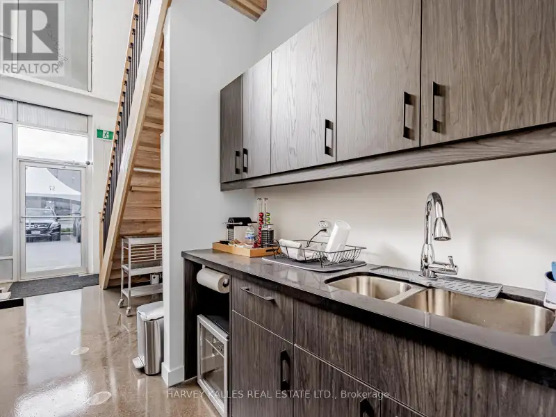 Fully Leased Commercial Condo in Prime Location on the Queensway