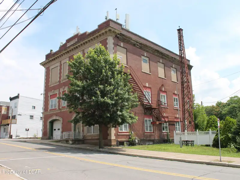 Former Municipal Building with Approved Plans for 12 or 15 Residential Units in Prime Location