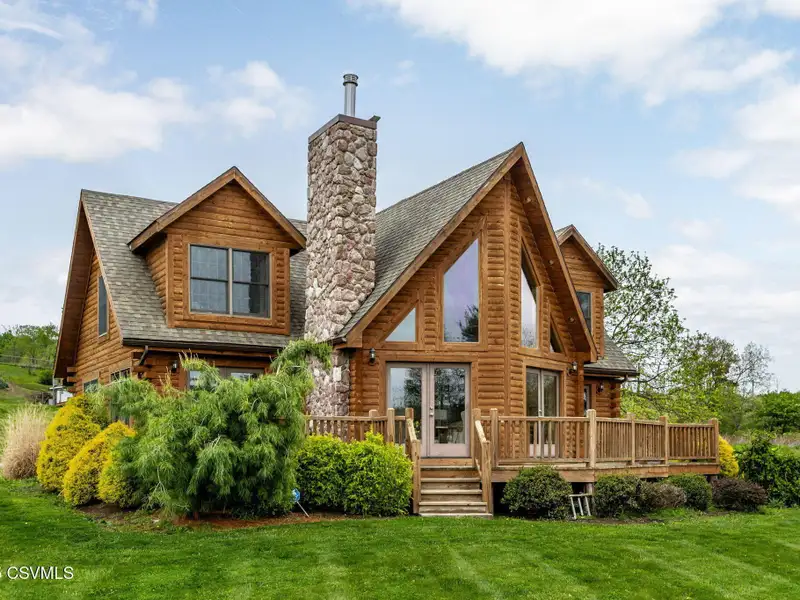 Commercial Log Home on 2 Acres with 3 Bedrooms and Scenic Views