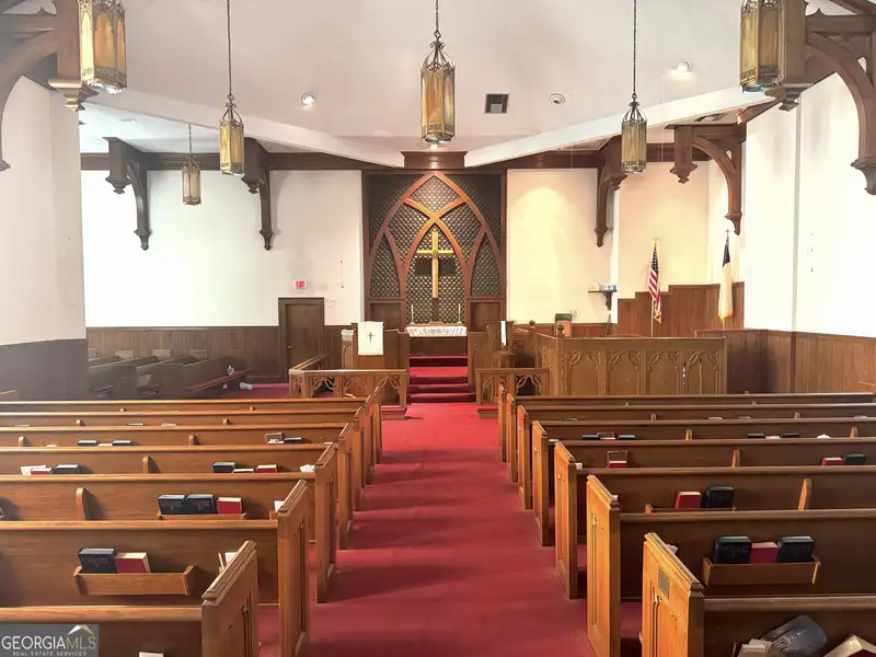 Historic Church with Sanctuary, Classrooms, Fellowship Hall, and Outdoor Event Space in Prime Location