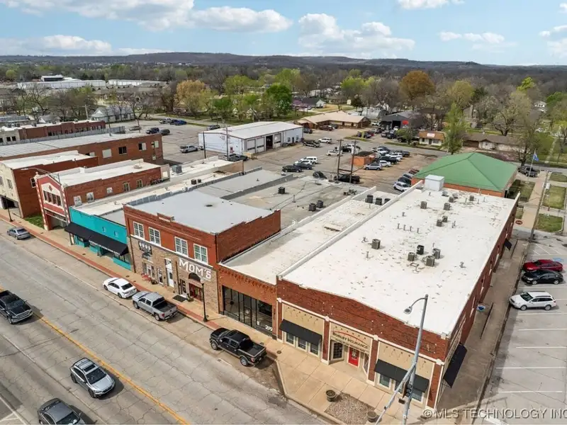 Historic Office Building with 9 Private Suites and Conference Room in Prime Location