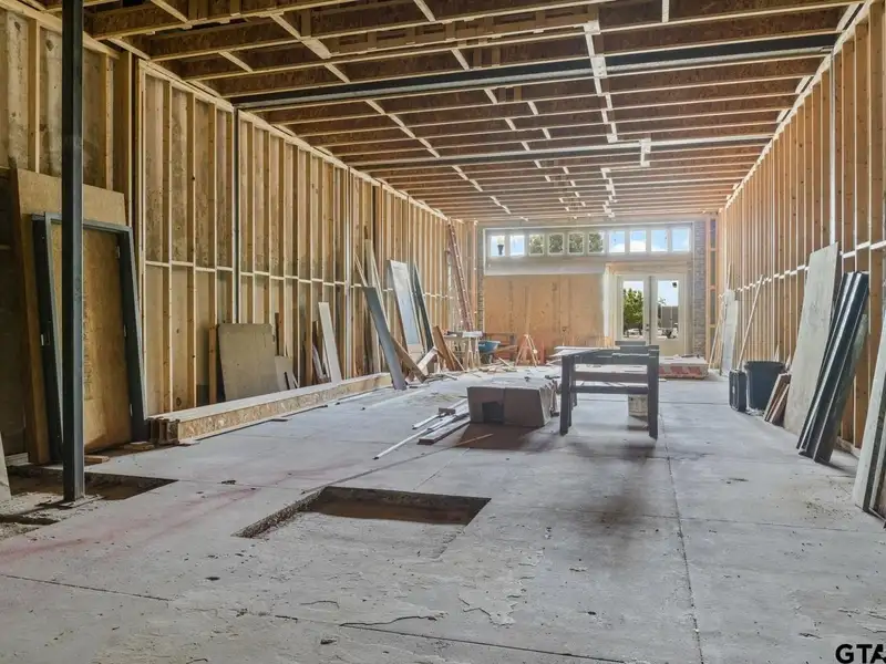 Unfinished Downtown Commercial Building with High Traffic Visibility and Mixed-use Potential