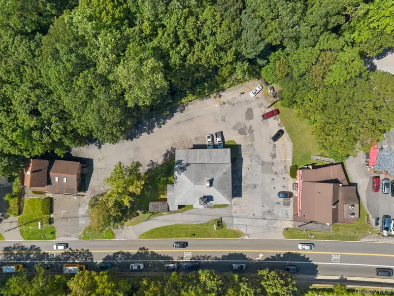 Prime Commercial Property with Restaurant and Retail Space on High-traffic Road