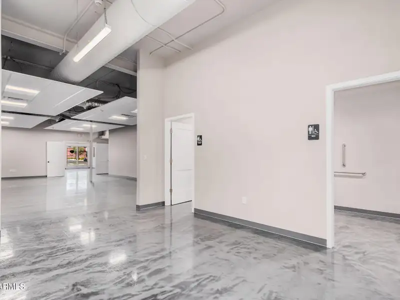 Versatile Commercial Property with Two Buildings and Ample Parking in Prime Location