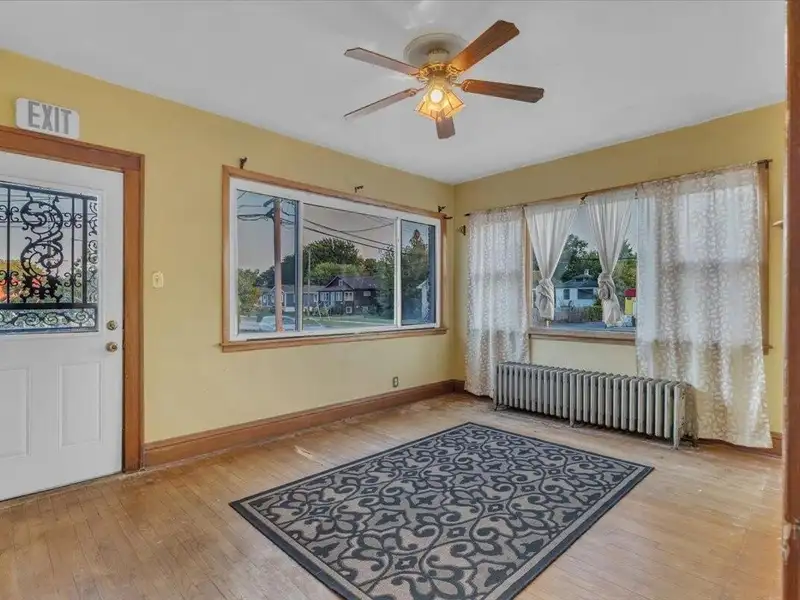 Versatile Corner Commercial Property with Retail Space and Two Apartments in Prime Location