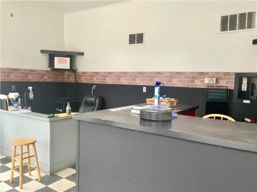 Multi-use Property in Prime Pleasant Valley Location with Office Space and Equipment